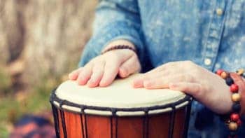 Woman playing the djembe